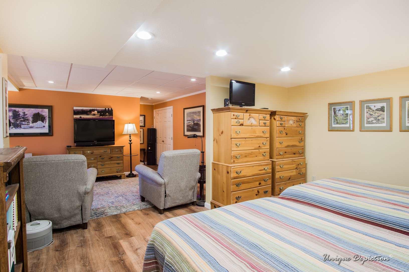 Basement Finishing A Cheerful and Bright StudioStyle Finished