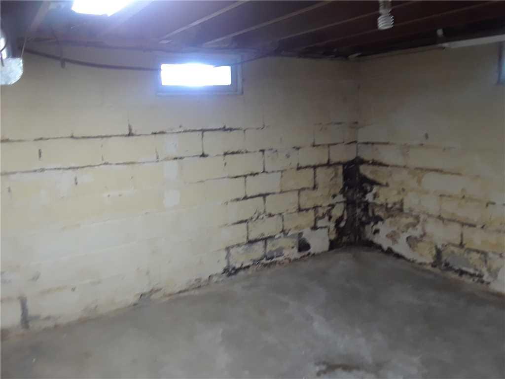 Foundation Repair Badly Cracked Waterloo, IL Basement Walls Supported