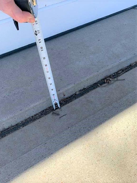 Concrete Lifting and Leveling Driveway Trip Hazard Eliminated in