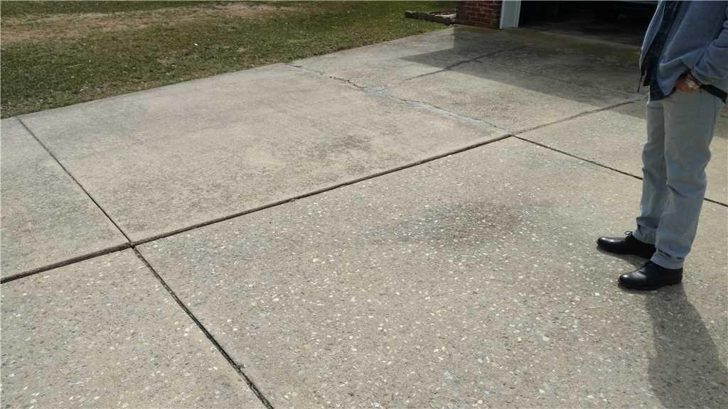 Concrete Leveling Sinking Concrete in Oxford, PA Before Driveway Repair