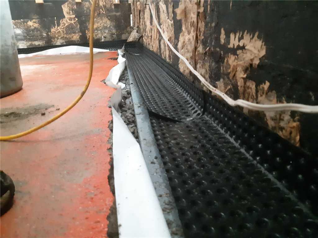 Imperméabilisation de soussol Installation d'un drain de semelle intérieur à BonConseil, Qc