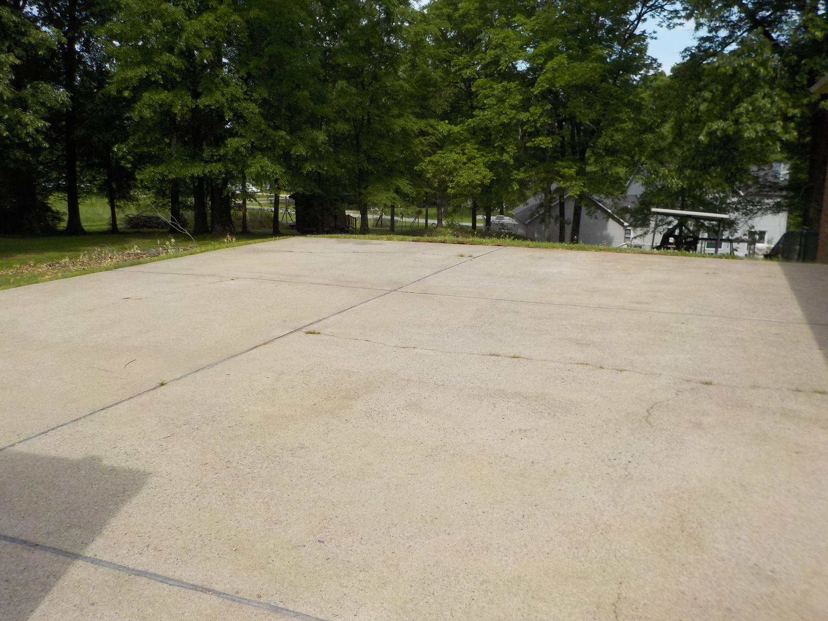 Concrete Leveling Concrete Driveway Lifted in Paducah, KY Uneven