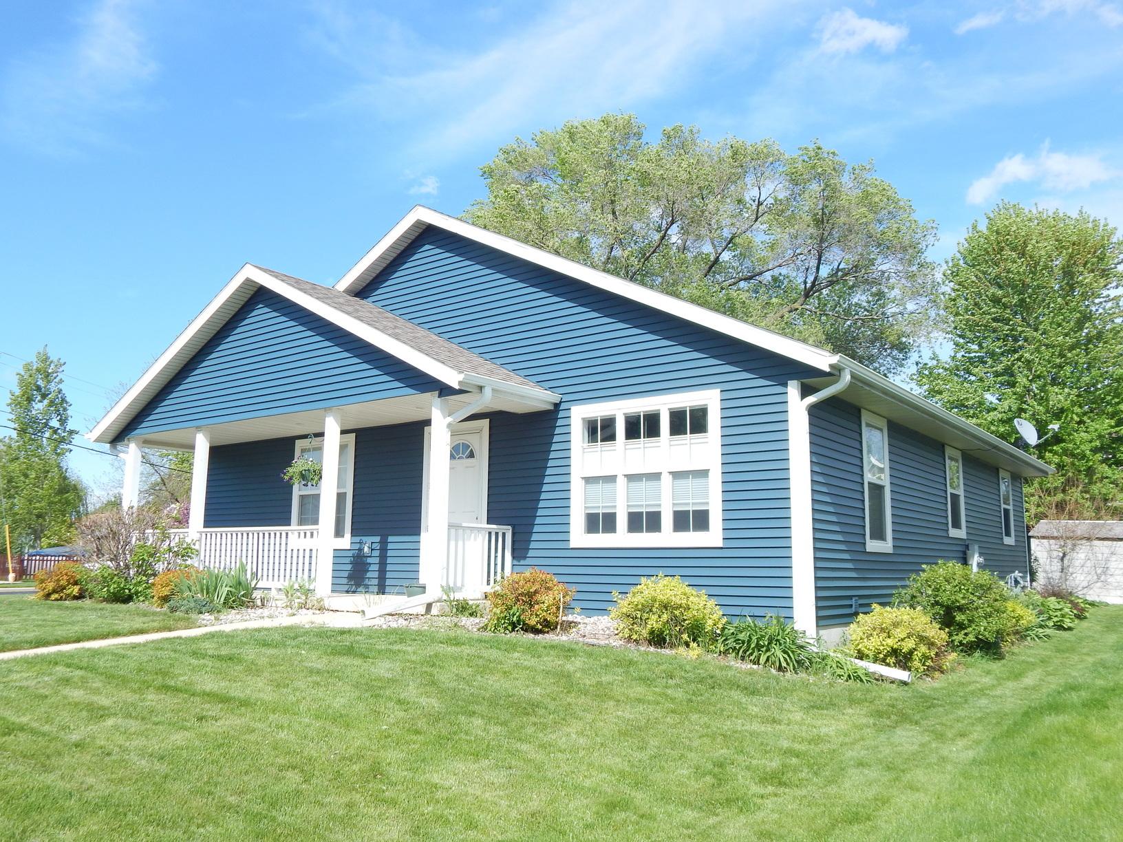 Siding New Siding & Gutters in Madison, WI After Photo Siding New Siding & Gutters in Madison, WI After Photo