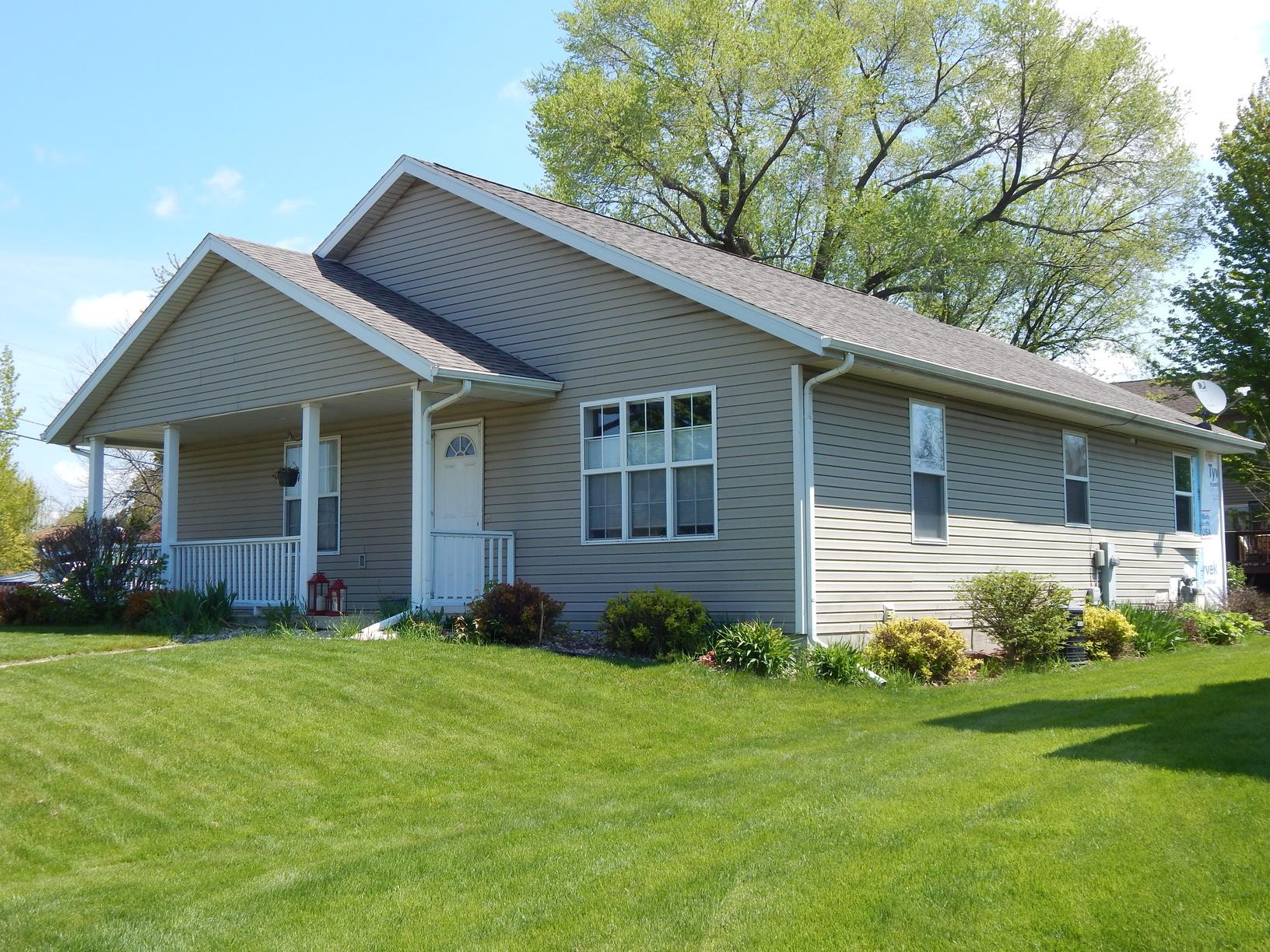 Siding New Siding & Gutters in Madison, WI Before Photo Siding New Siding & Gutters in Madison, WI Before Photo
