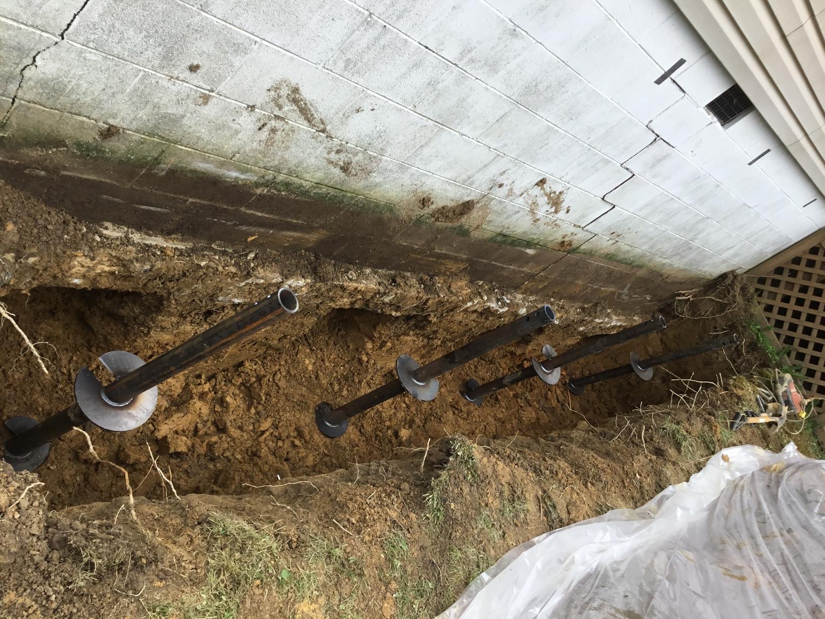 The Basement Doctor of Cincinnati Photo Album Helical Piers used to
