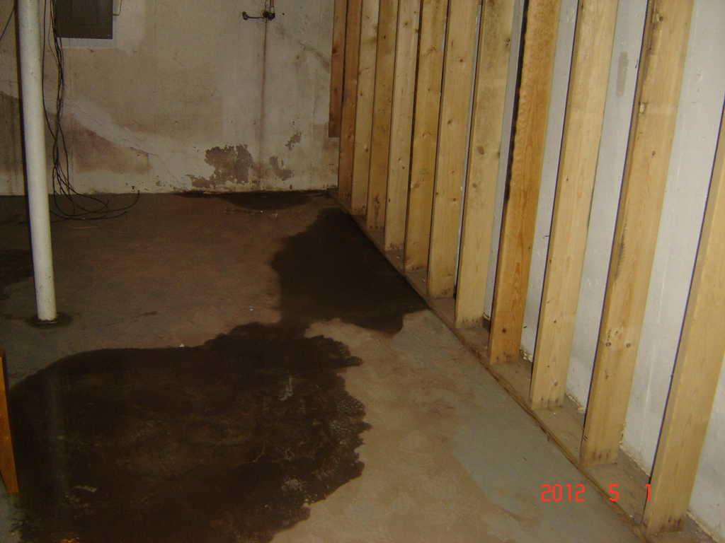 Basement Waterproofing Water Damages floor in Breese, IL Water Leakage