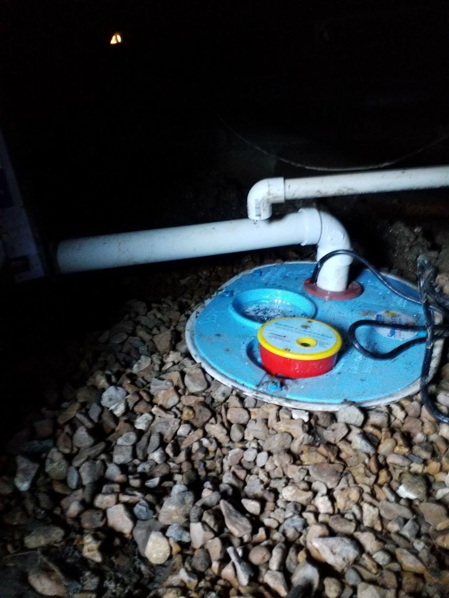 Basement Waterproofing Adding a Sump Pump and Discharge Line SmartSump™ Installed