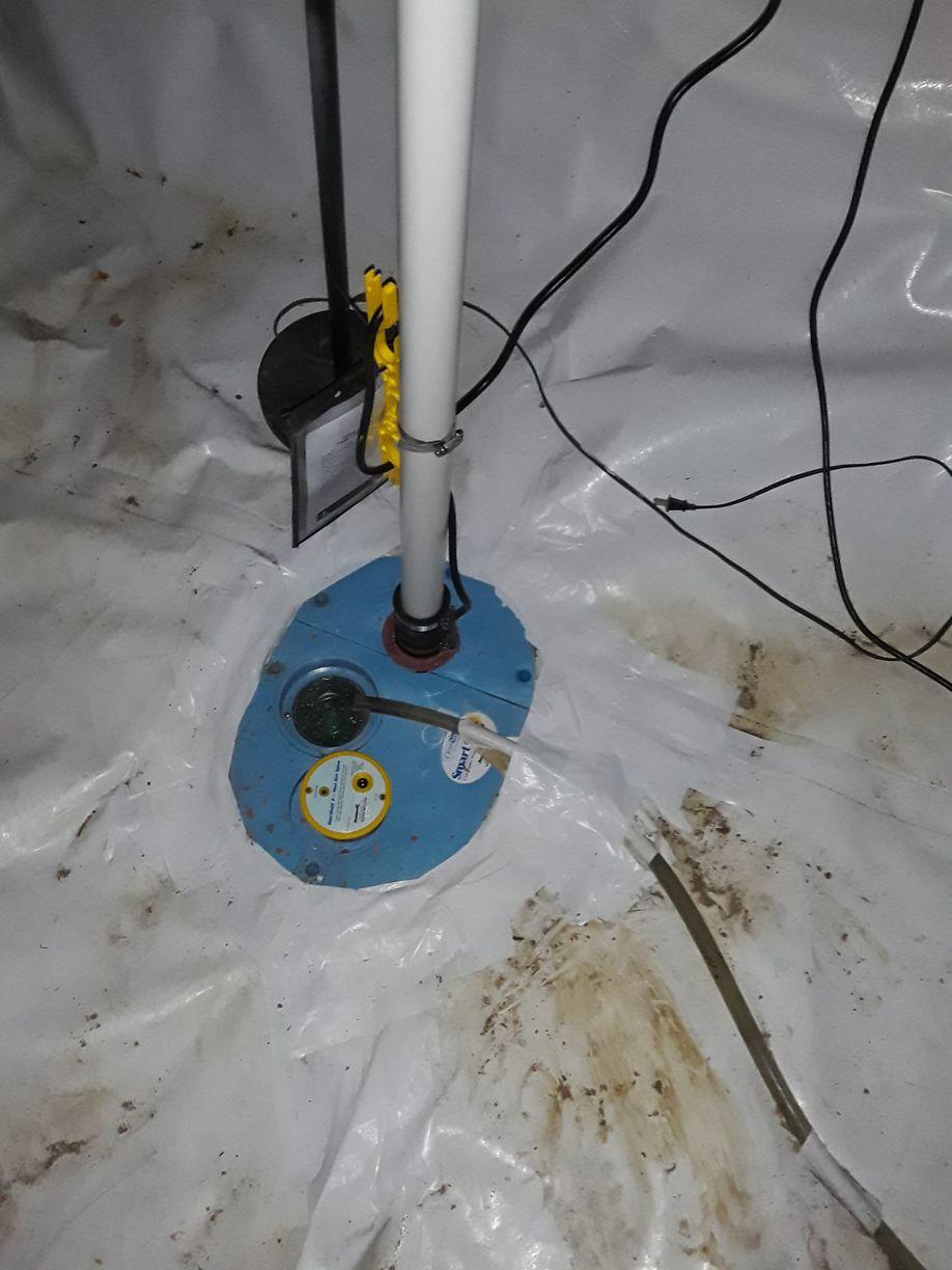 Crawl Space Repair Cleaning Up a Dirt Crawlspace SmartSump™ in the