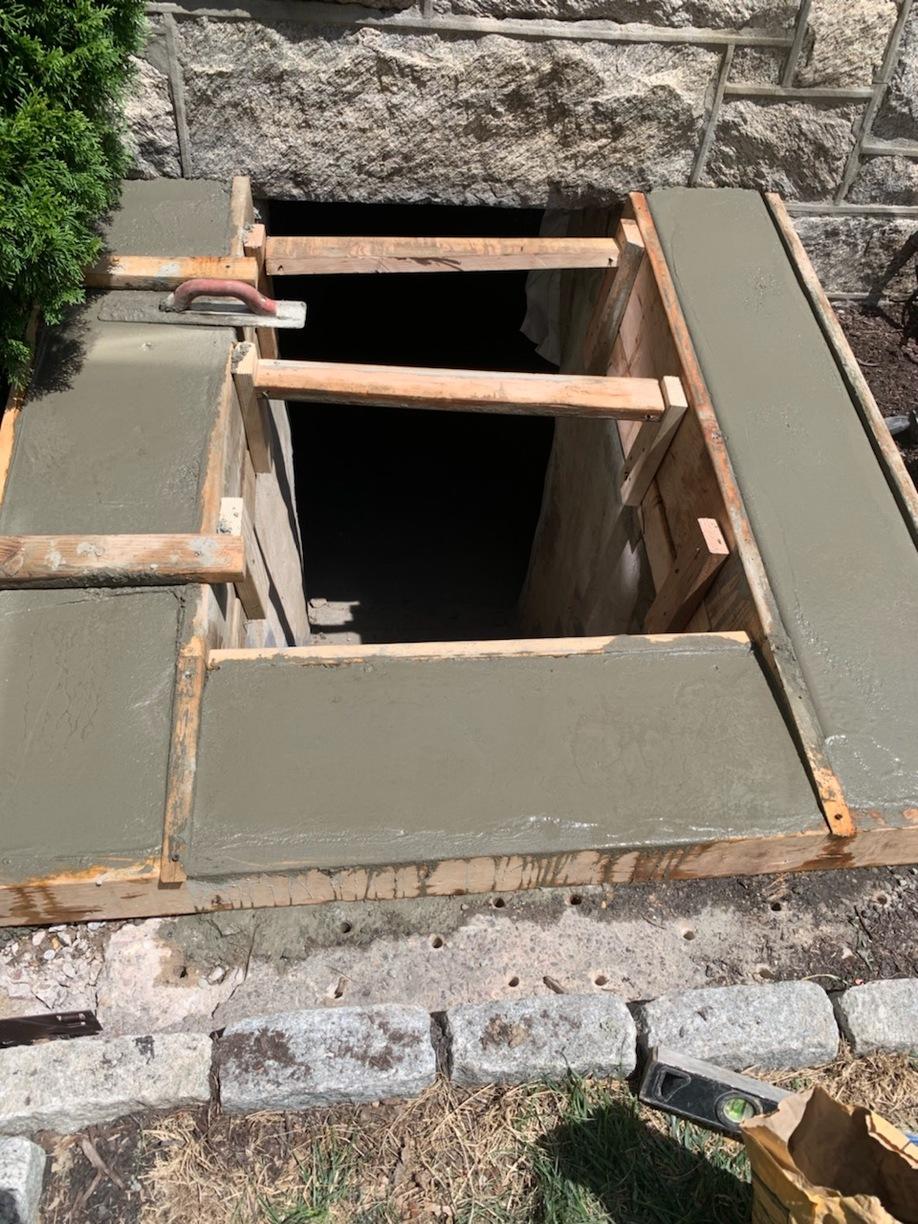 Cellar Doors Concrete repair and Flat Cellar door installed in