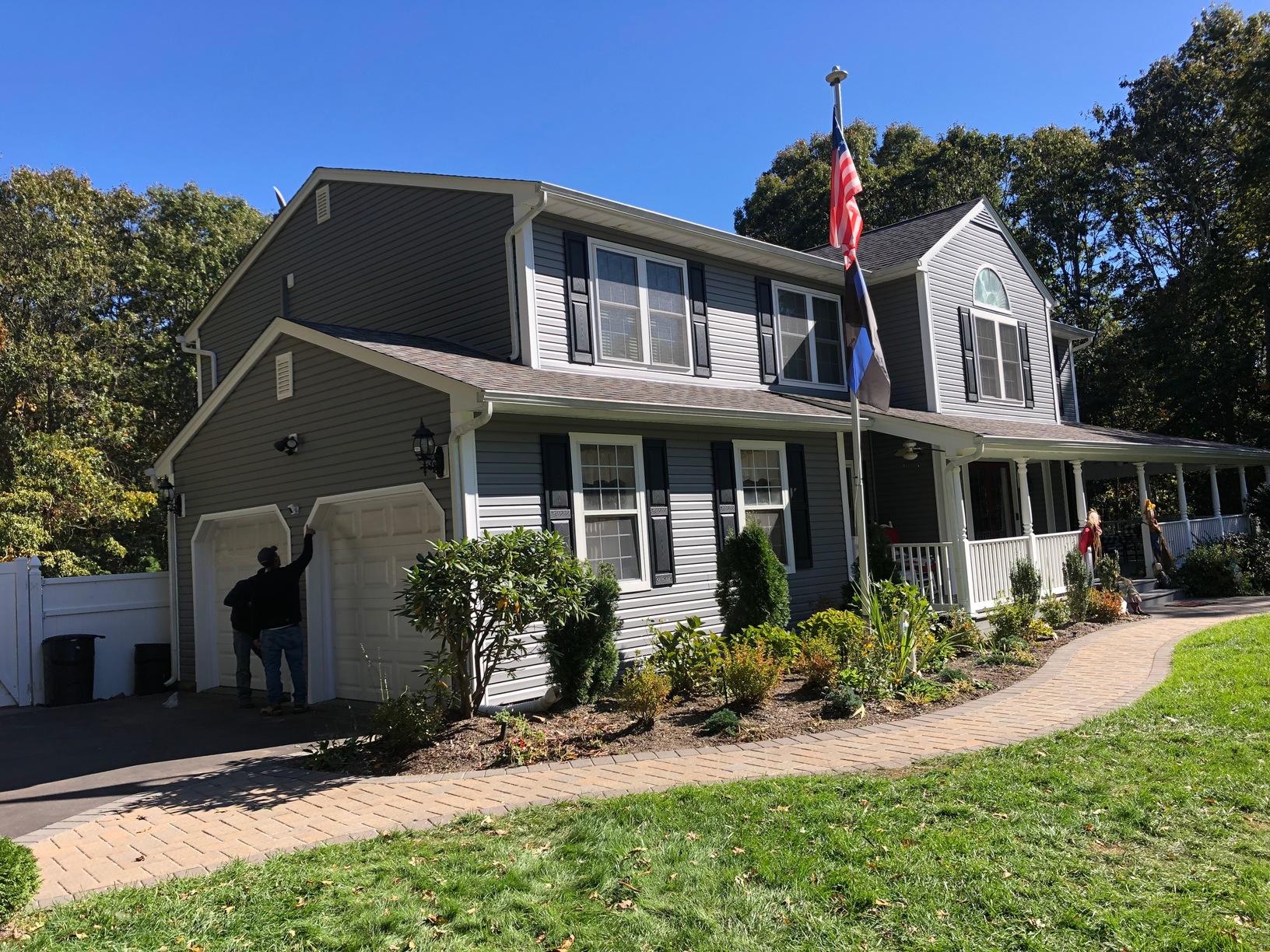 Roof Repair Manorville Vinyl Siding Before and After