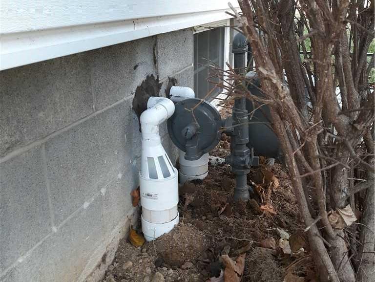 Basement Waterproofing System in Fairmont, WV Sump Pump Line Extended