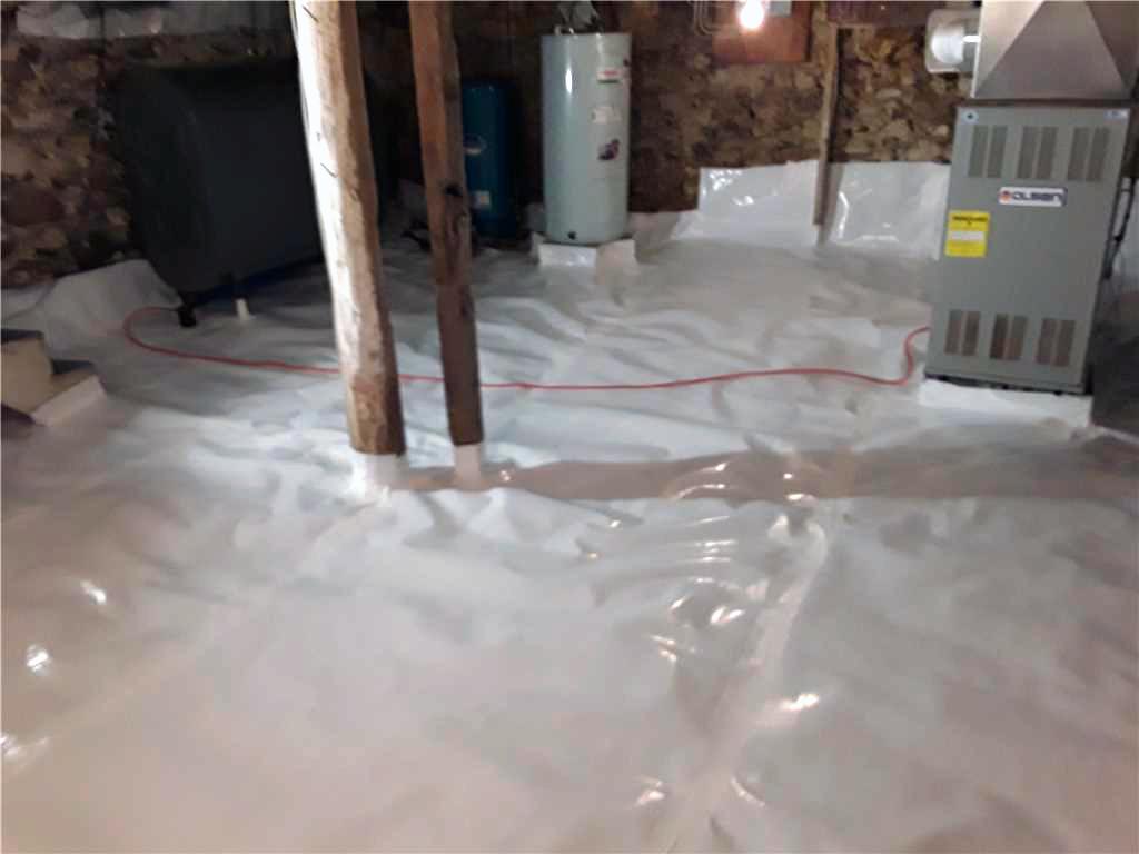 Basement Waterproofing - Century Old Home Threatened by Damp Basement