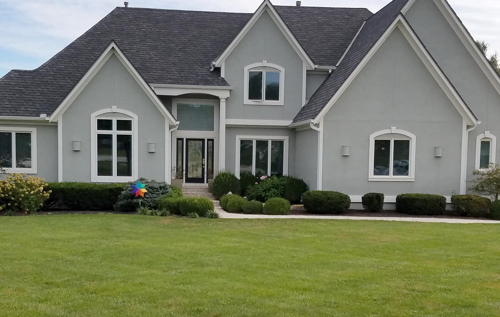 Two New Vinylmax Vinyl Windows Installed in Olathe, KS Home with a