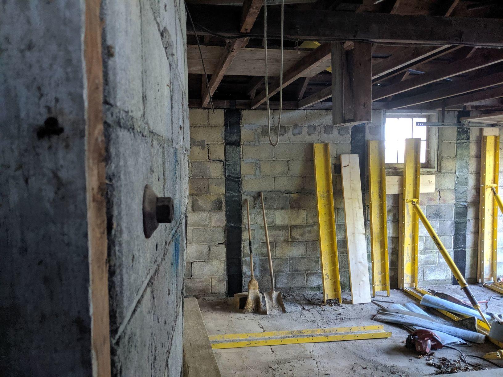 Foundation Repair Woodford Wall Pushing System WWPS being removed