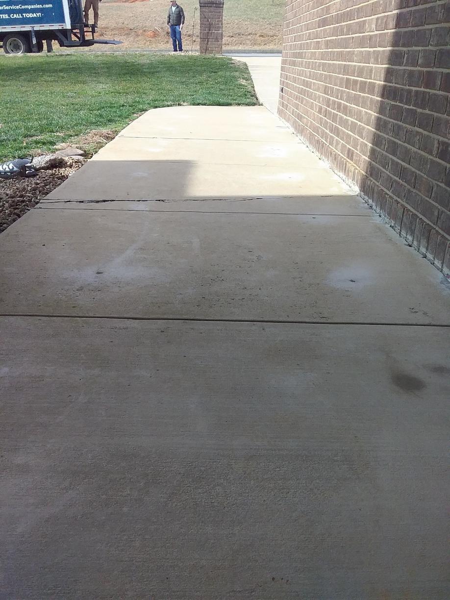 Concrete Leveling Raising a Sidewalk in Blountville, TN PolyLyft