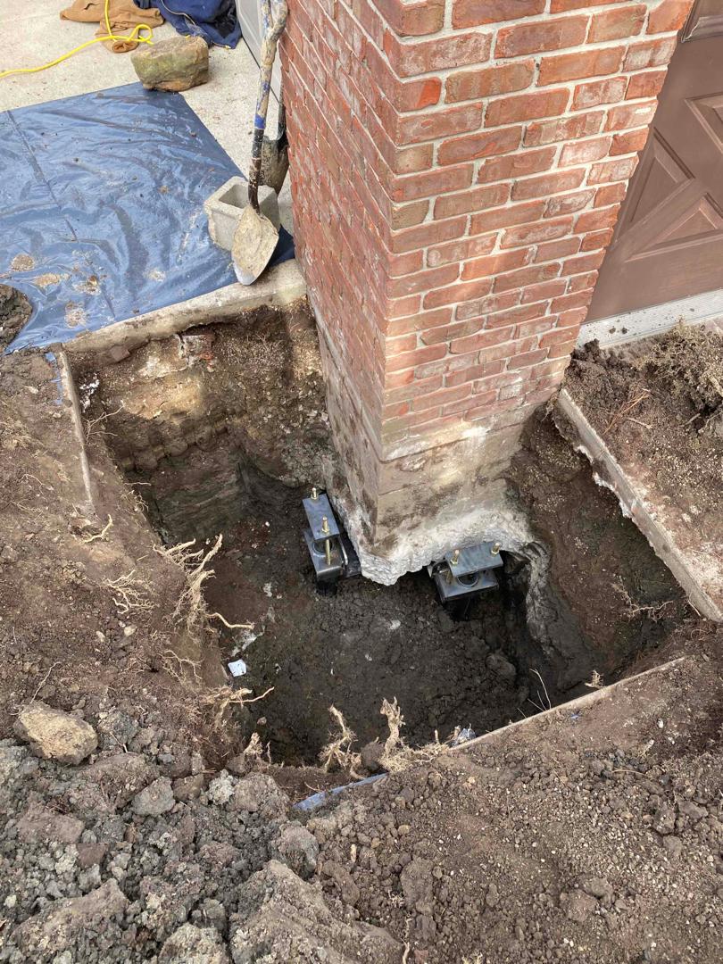 Helical Pier Installation | Queen Foundation Repair