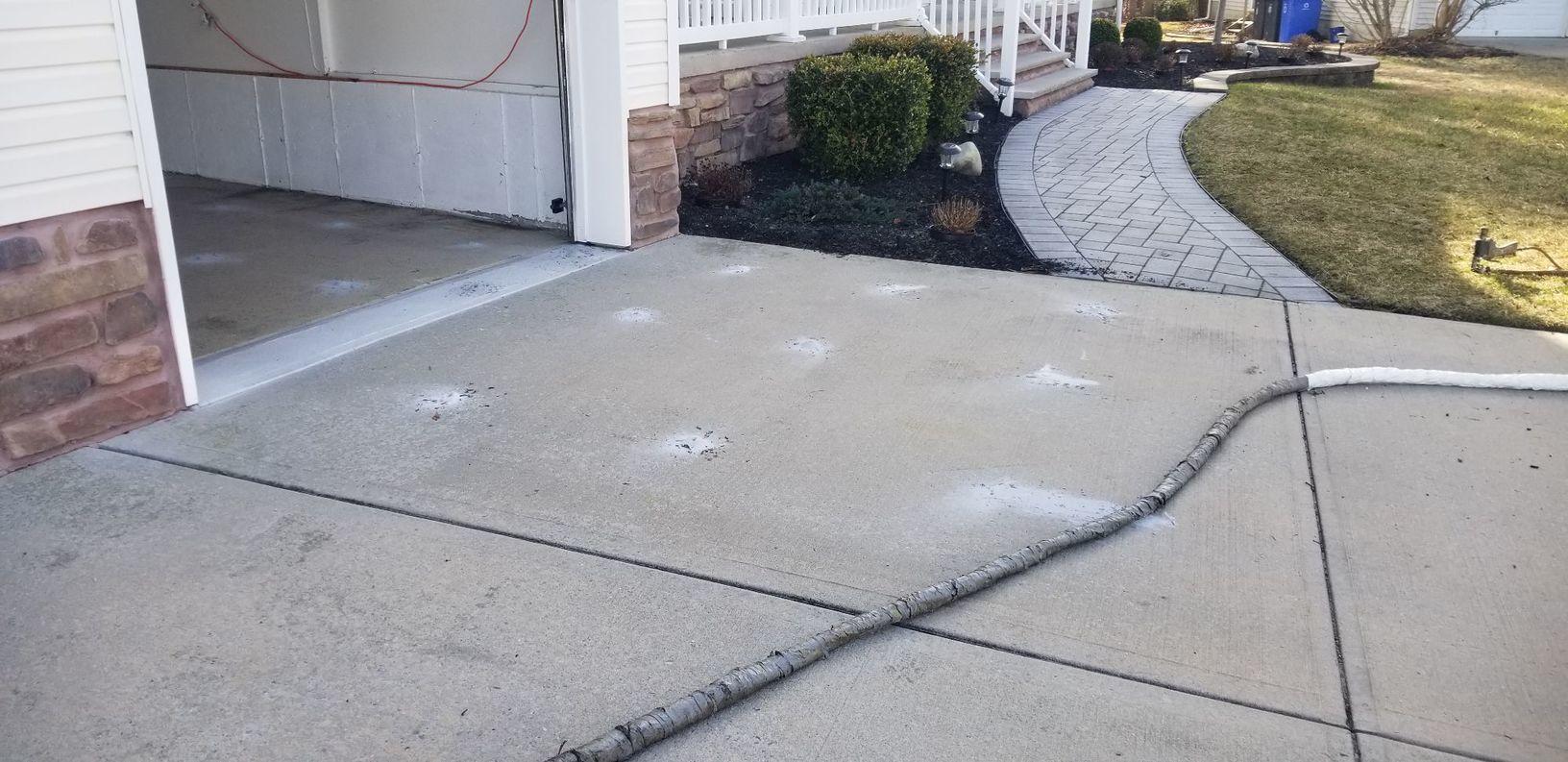 Concrete Lifting and Leveling Driveway Raised in Manahawkin, NJ