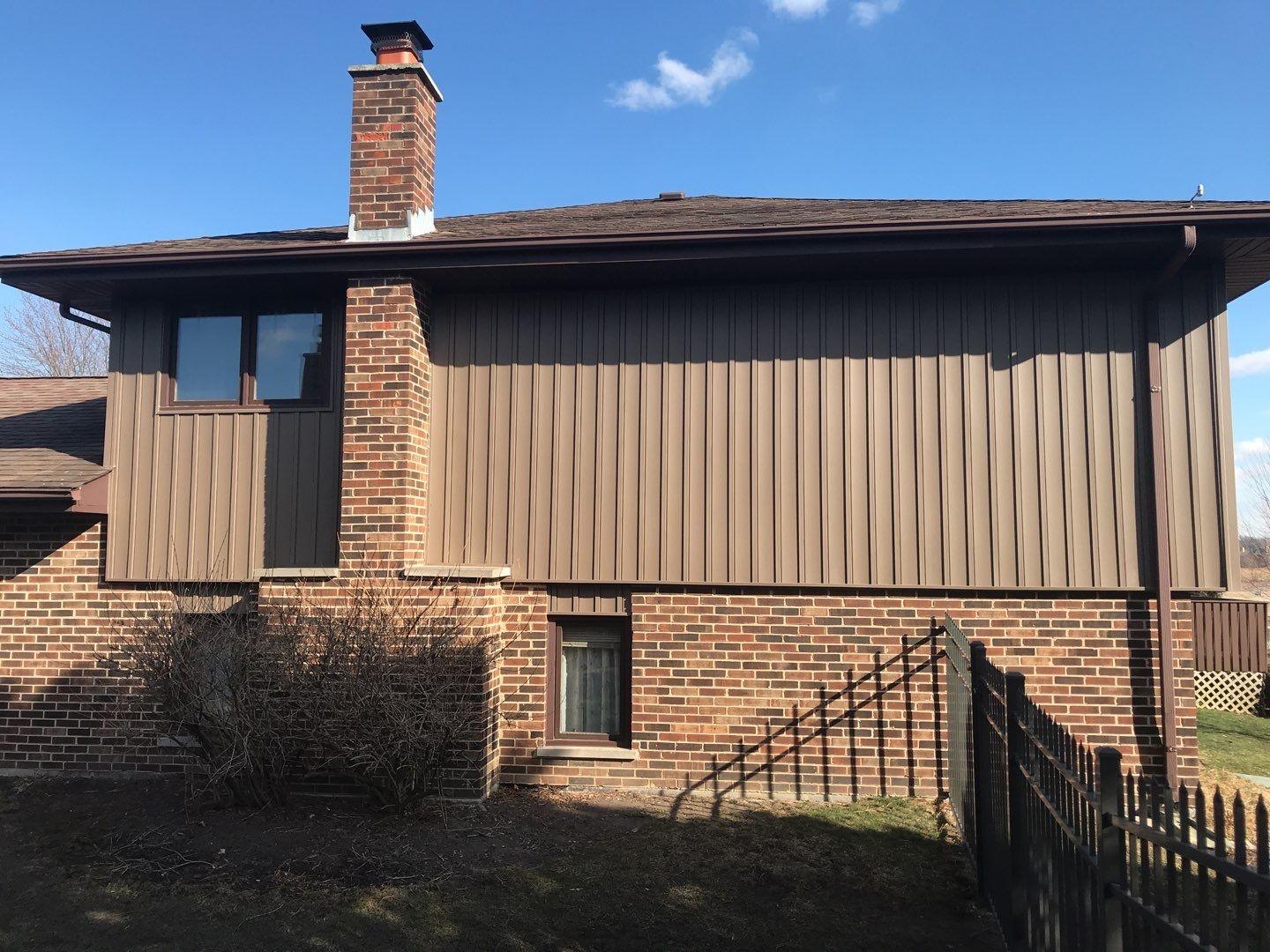 Variform Siding installation in Orland Park, IL Chimney side of the house