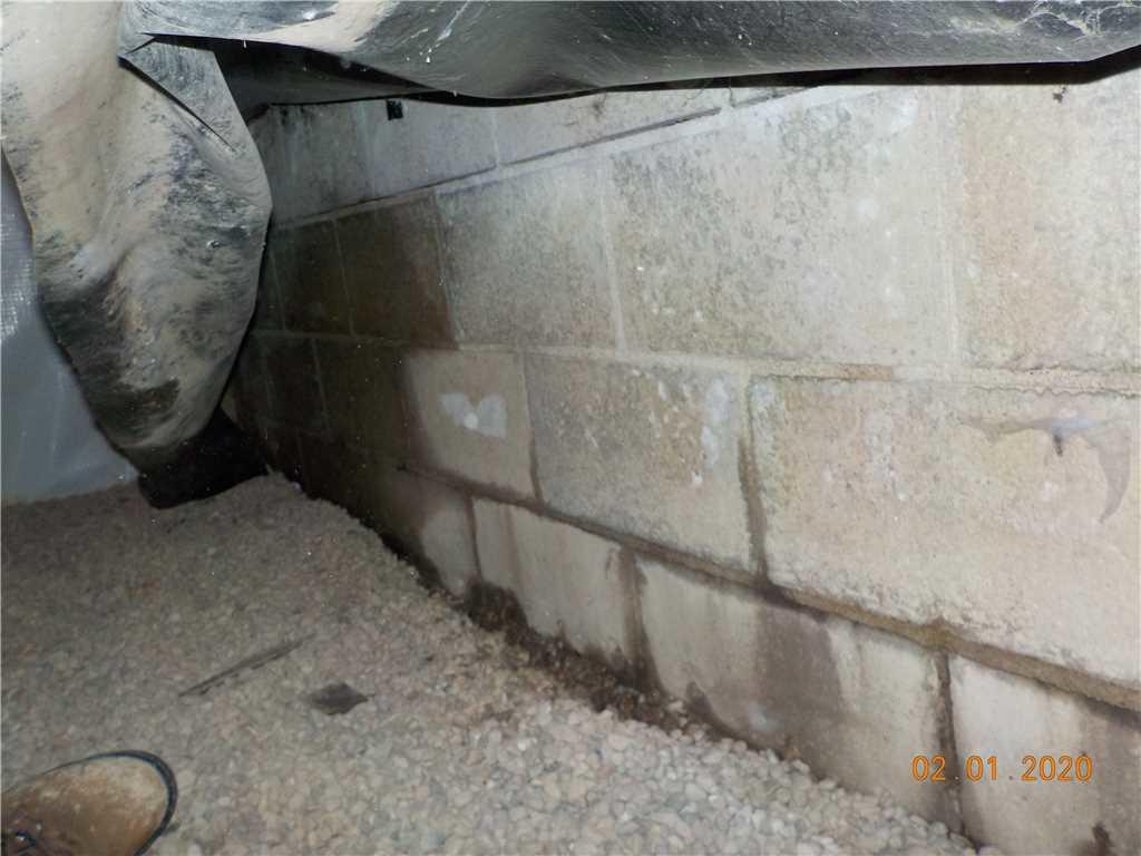 Foundation Repair Saving a Settling House in Grand Rapids MI Signs