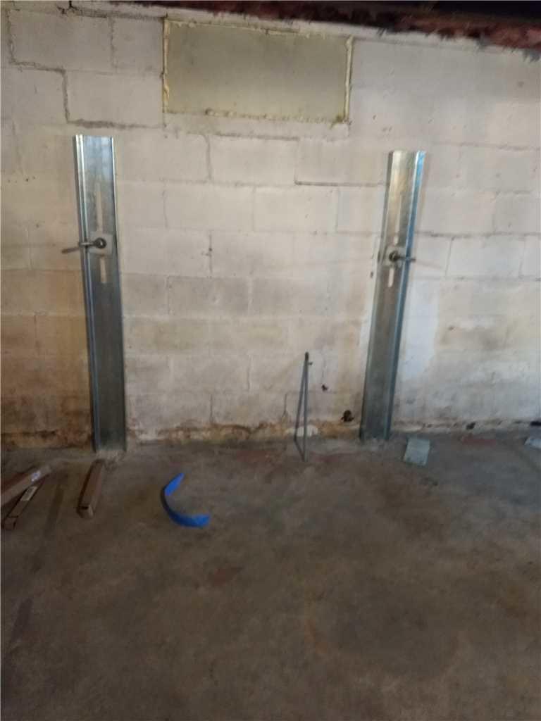 Basement Waterproofing Fixing a Bowing Basement Wall in Newaygo MI