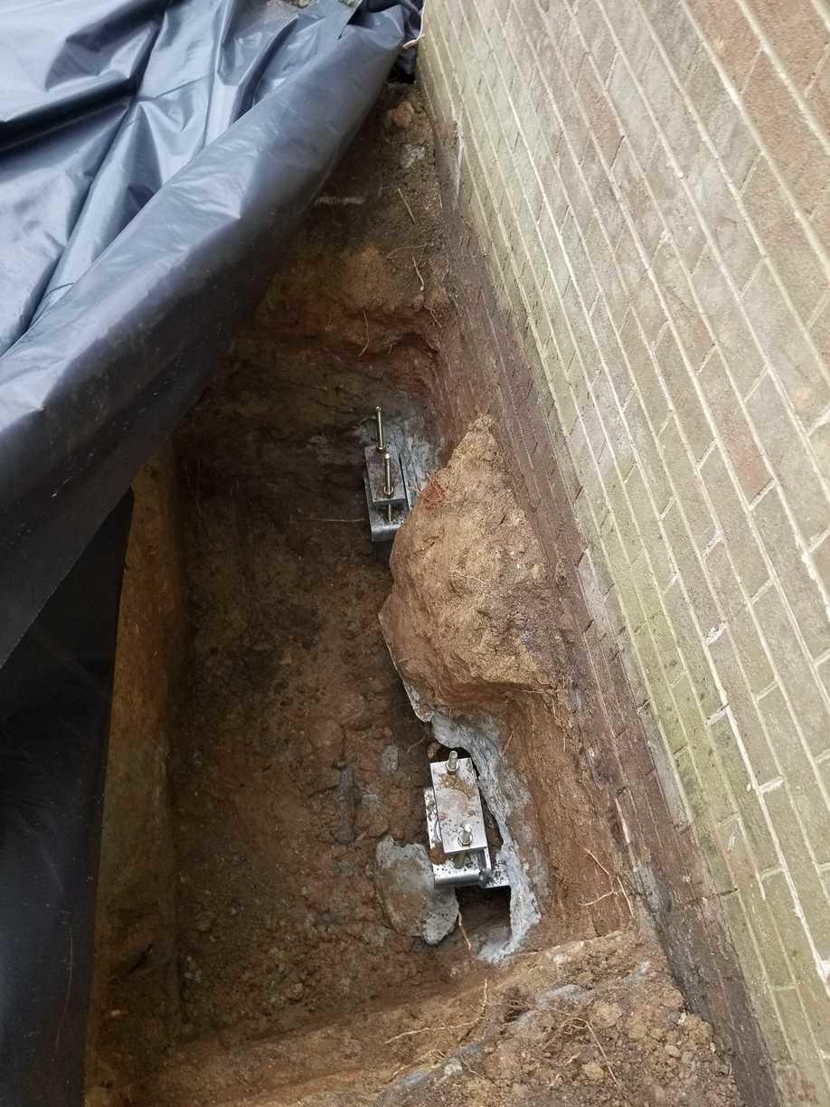 Foundation Repair Cracks in Exterior Wall Closed by