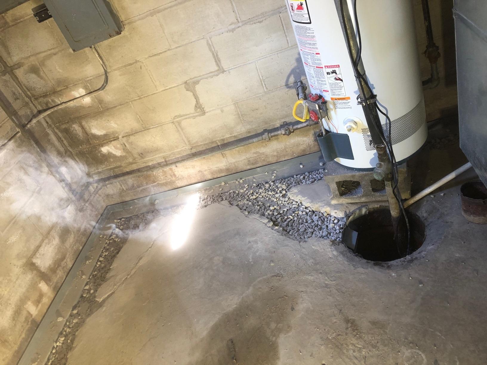 Basement Waterproofing WaterGuard Drains Water Outside in Saint