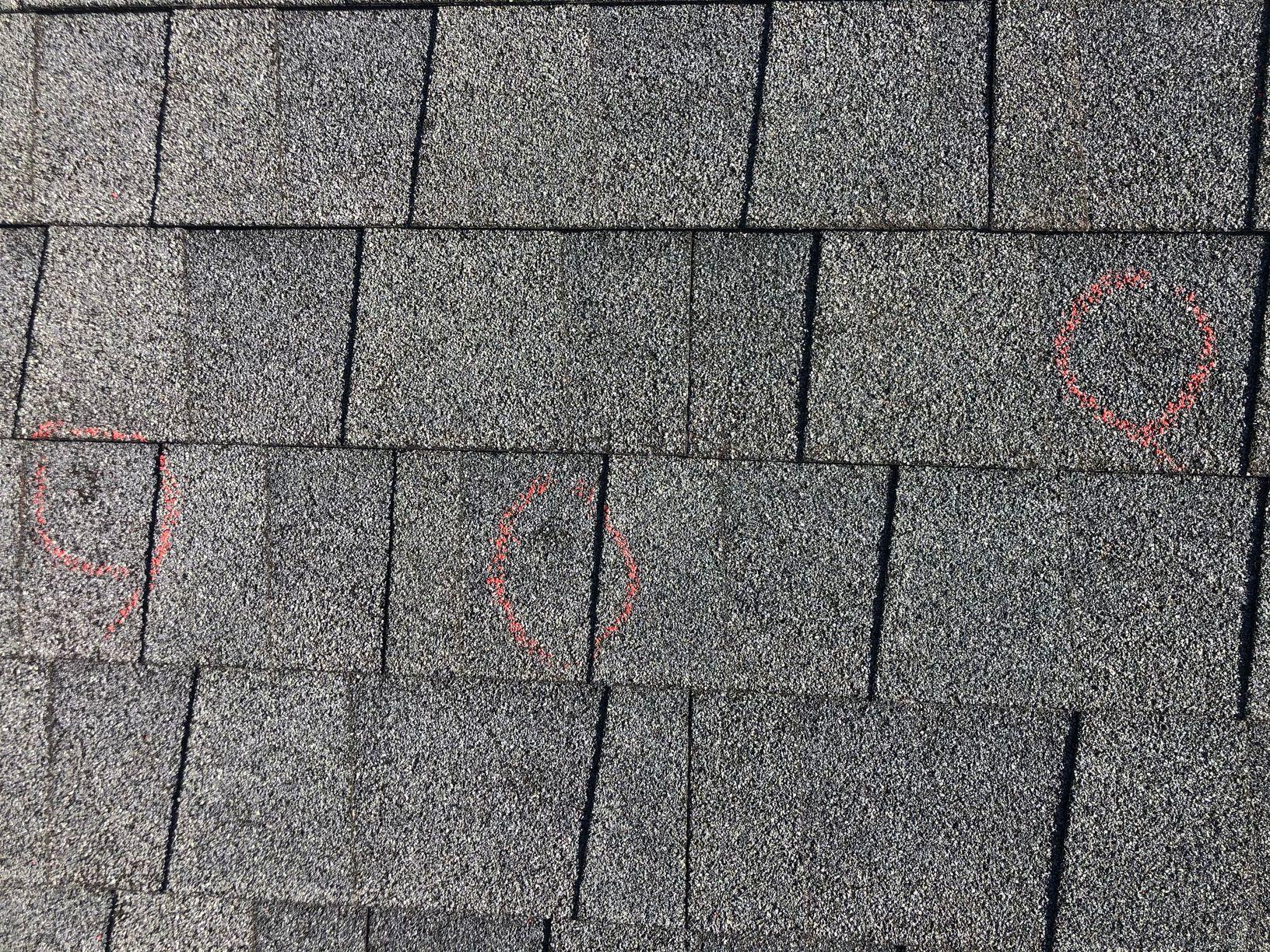 Roof Replacement Storm damage to roof and siding Hail Bruise