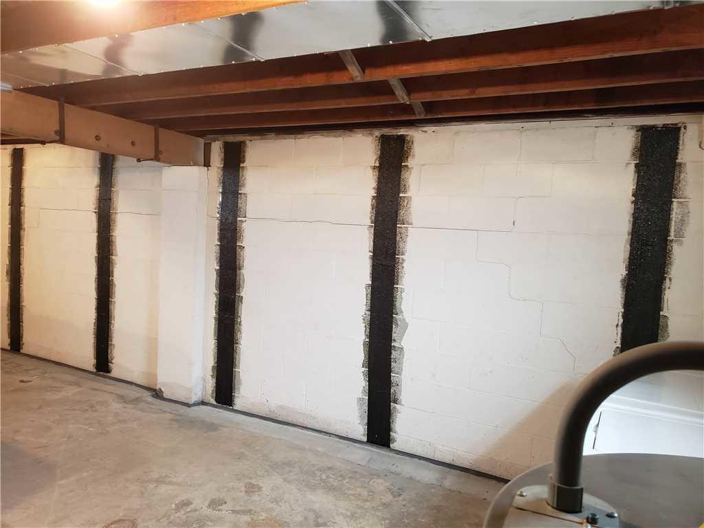 Bowing Wall Repair Waterproofing and Bowed Wall Repair with Carbon