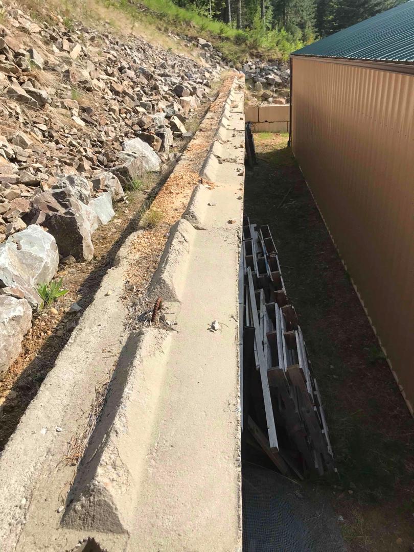 Foundation Repair Wall Sinking in Kingston, ID Side view of the
