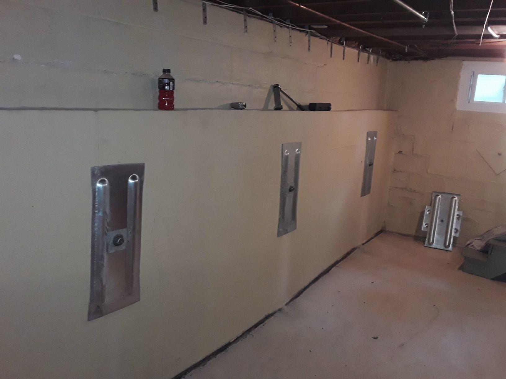 Foundation Repair Installing GeoLock Wall Anchors in Saint Louis Home