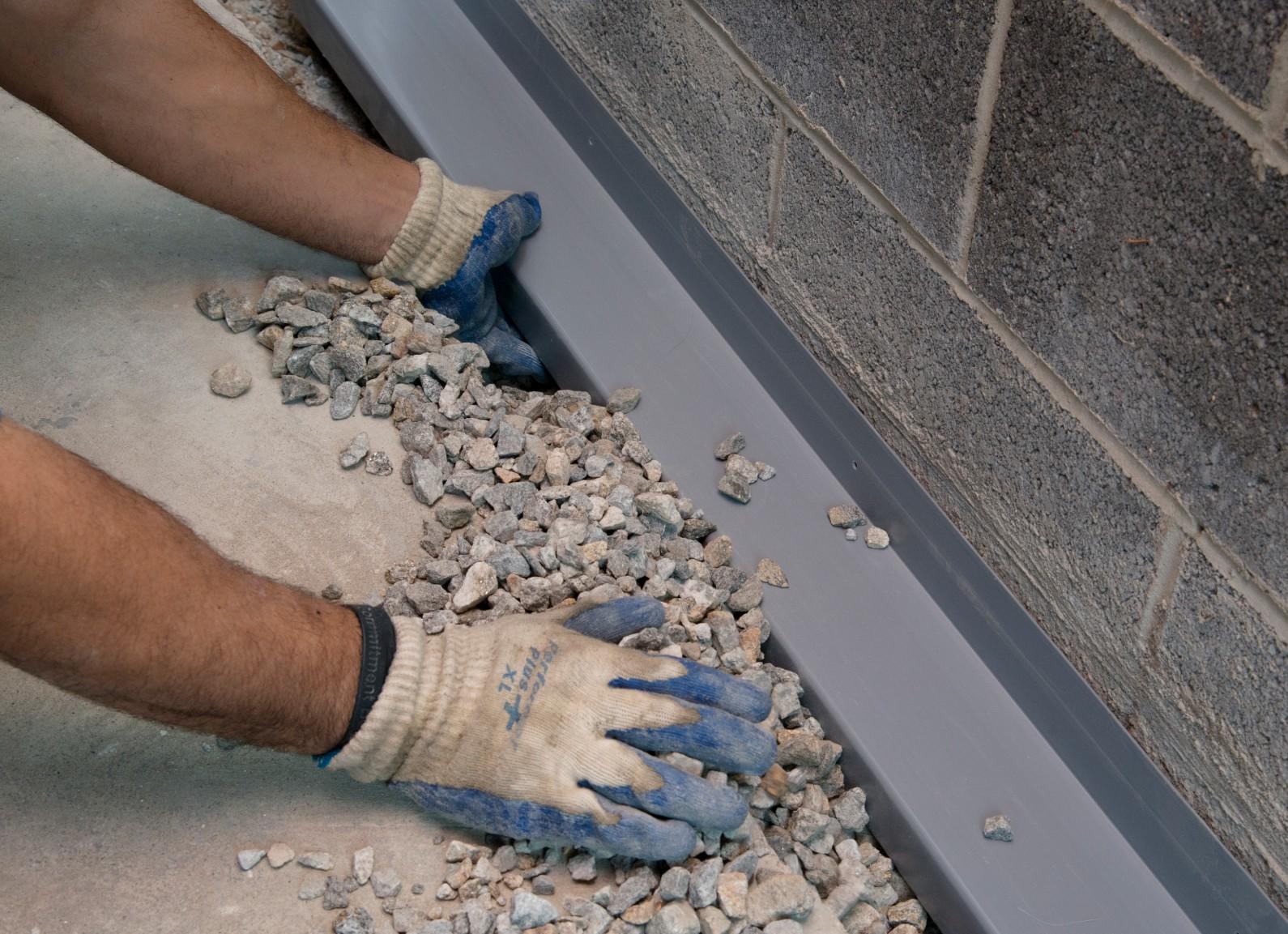 Basement Systems of Indiana - WaterGuard Installation in Progress