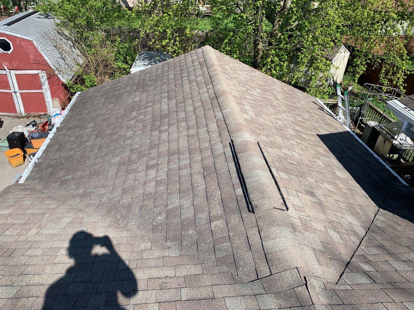 Roof Replacement Storm Damage to old roof on the house and shed Old