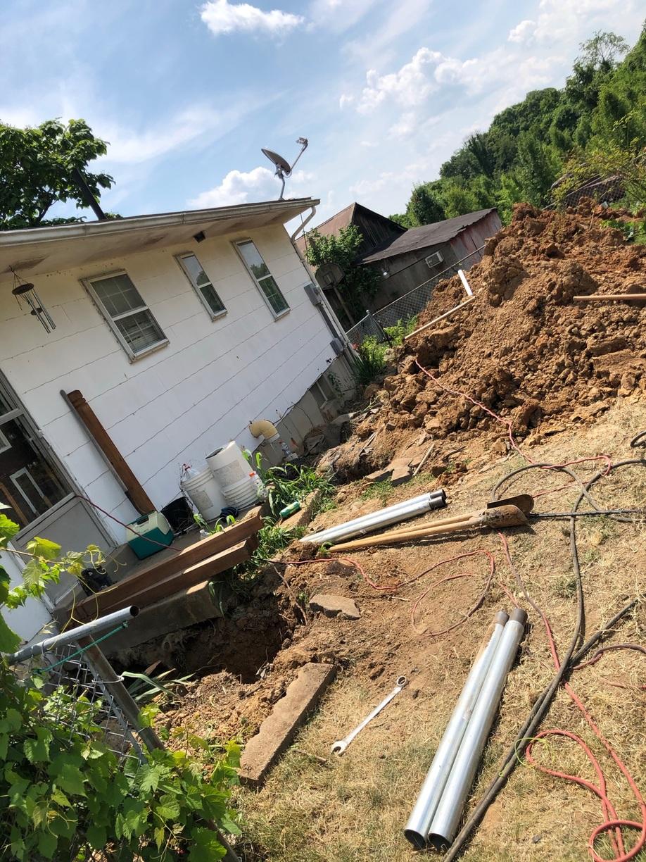 Foundation Repair Repairing Foundation with PushPiers Lifting