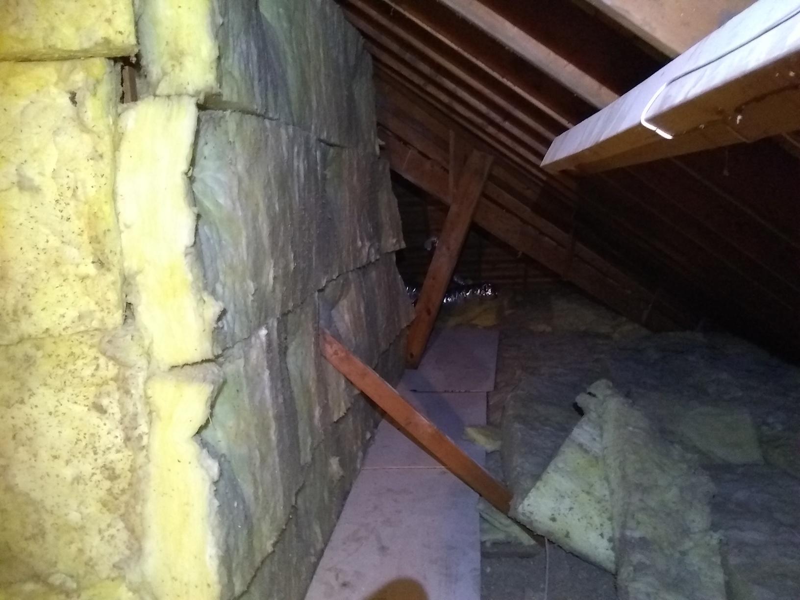 Attic Retrofit in Stilwell, Ks Old Fiberglass Insulation