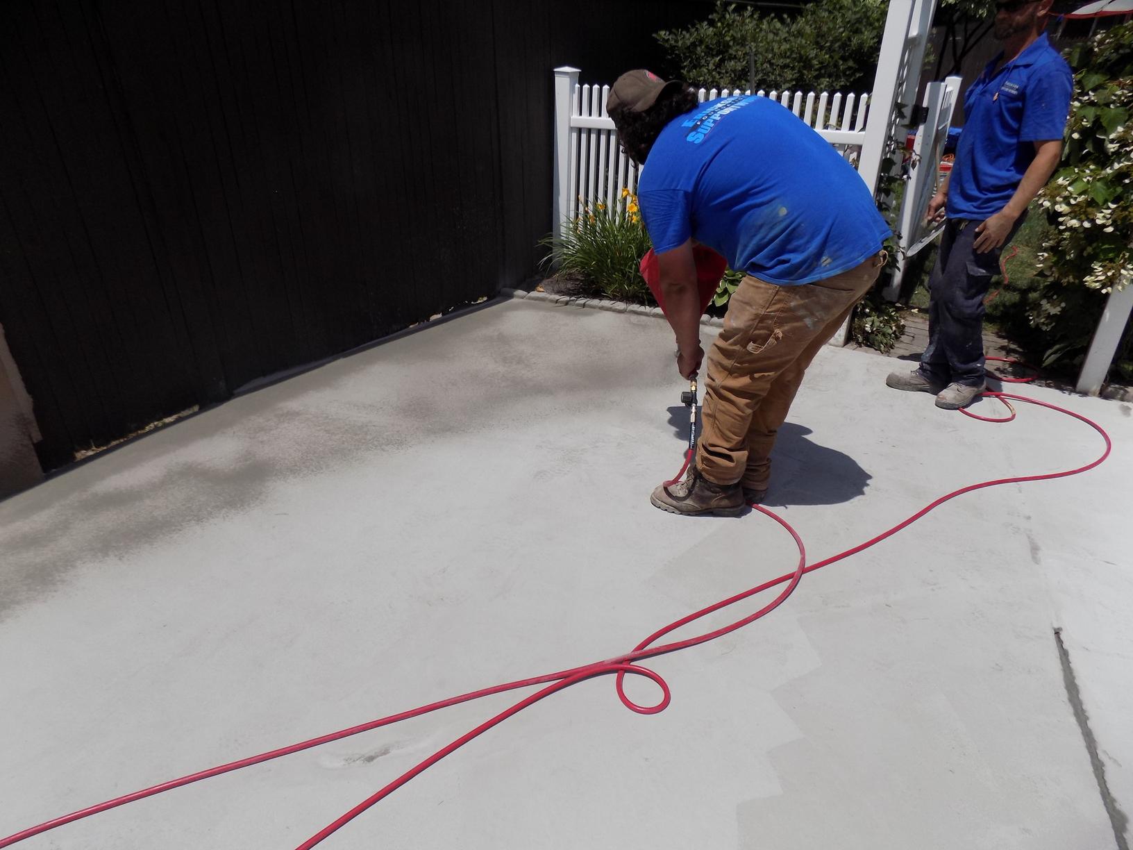 Concrete Repair Pool Patio Resurfacing, Salem, NH Spraying the Surface