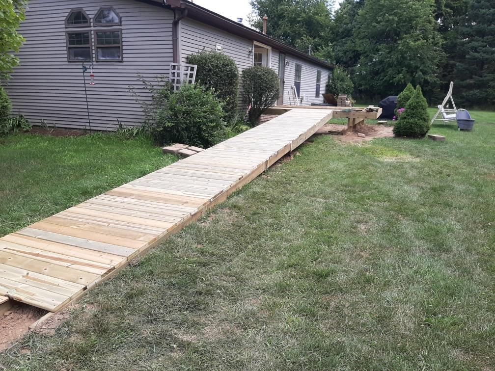 Decks Treated Deck Ramp Installation in Alto, MI Deck Accessibility