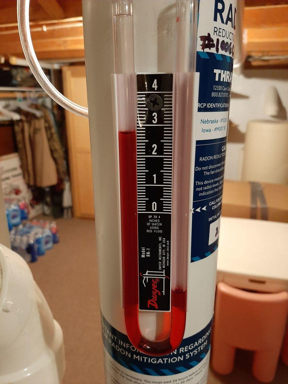National Radon Defense Midwest Manometer on Extraction Point of a