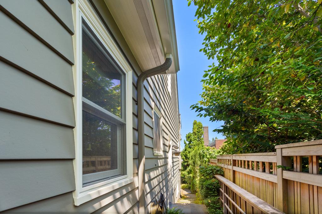 Siding Charming Seattle Home featuring Mitered corners Seamless Gutters