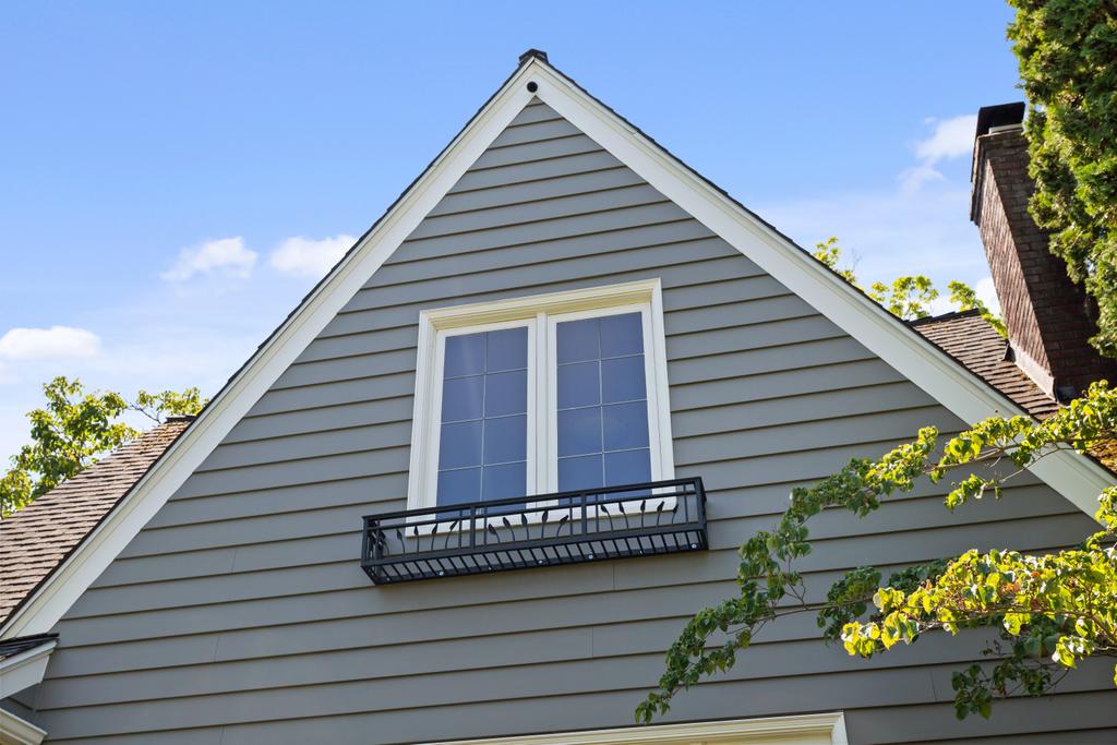 Siding Charming Seattle Home featuring Mitered corners Gutter
