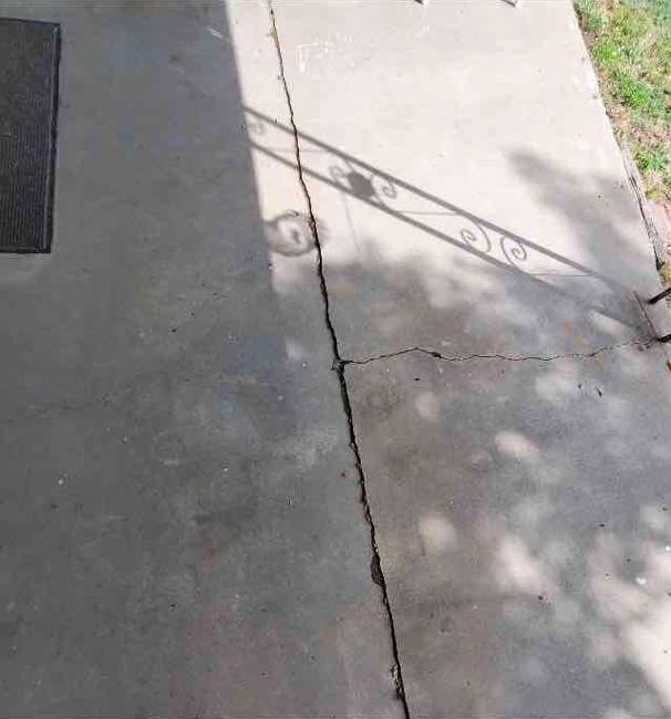 Concrete Repair Stabilizing and Sealing Concrete Porch in Providence