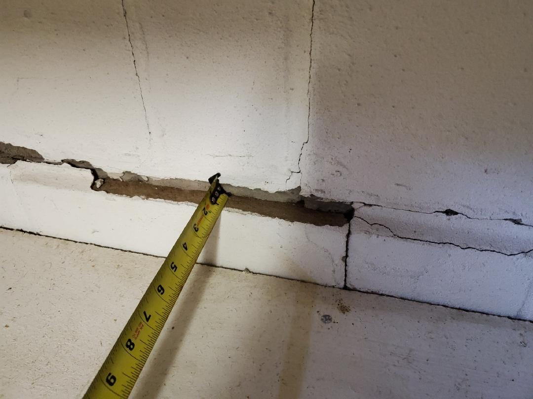 Foundation Repair Foundation and Waterproofing Systems Installed to Support Old Block