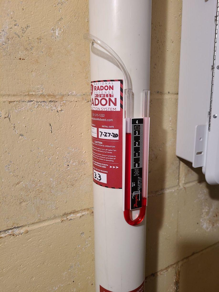 Radon Defense Midwest Manometer of Depressurization Radon Mitigation
