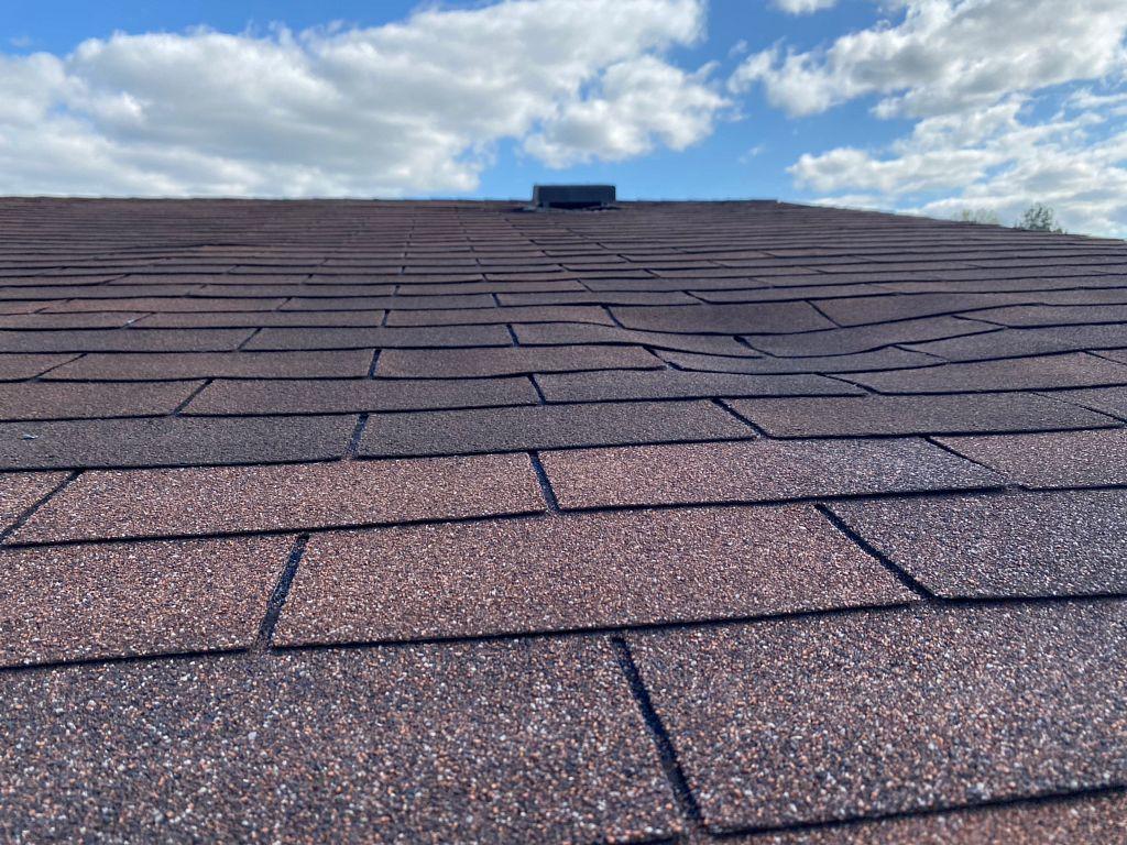 Replacing Warped and Damaged Roof in Randleman, NC Sinking Roof