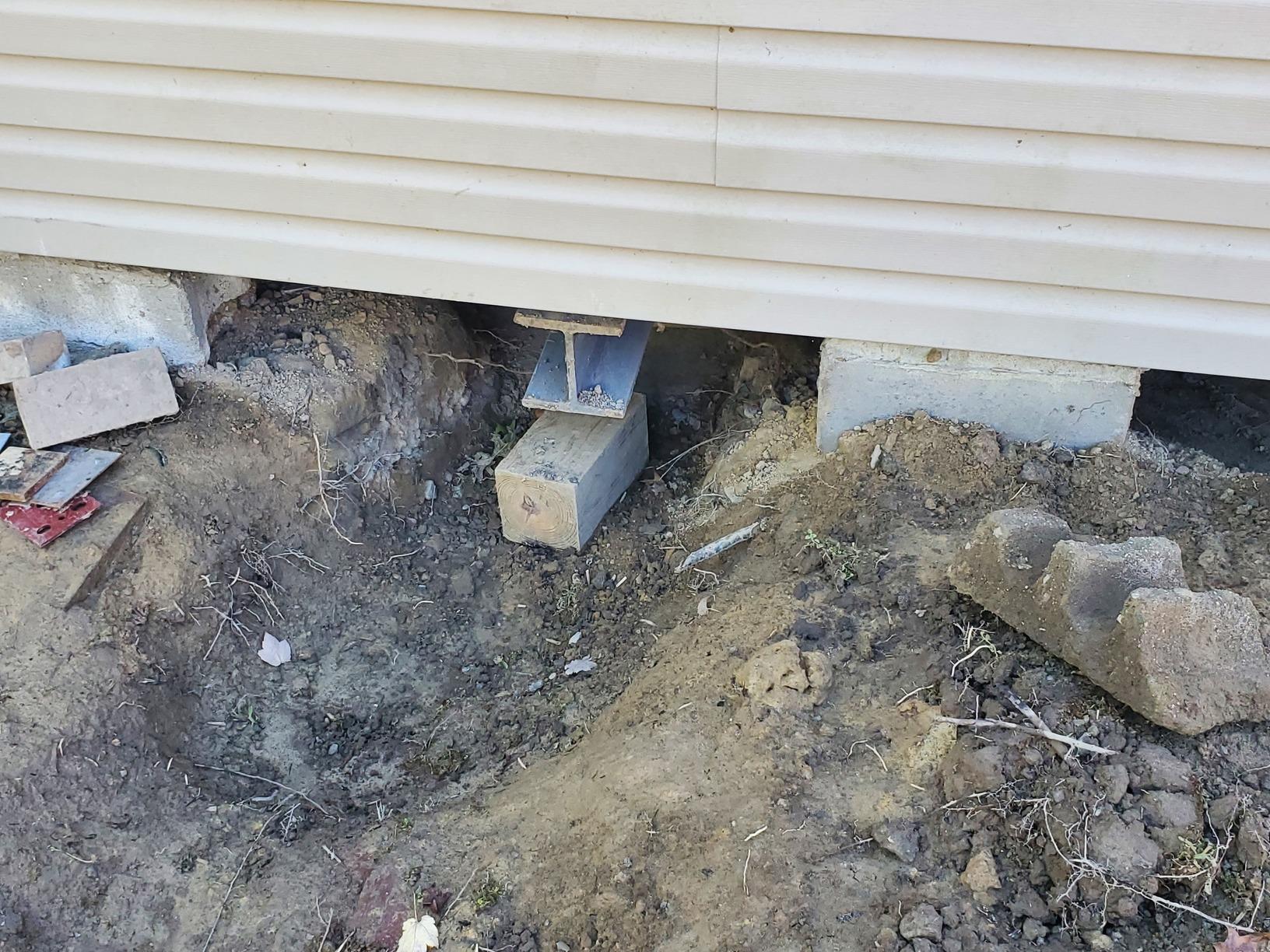 Foundation Repair Sistering Floor Joists and Replacing The Main
