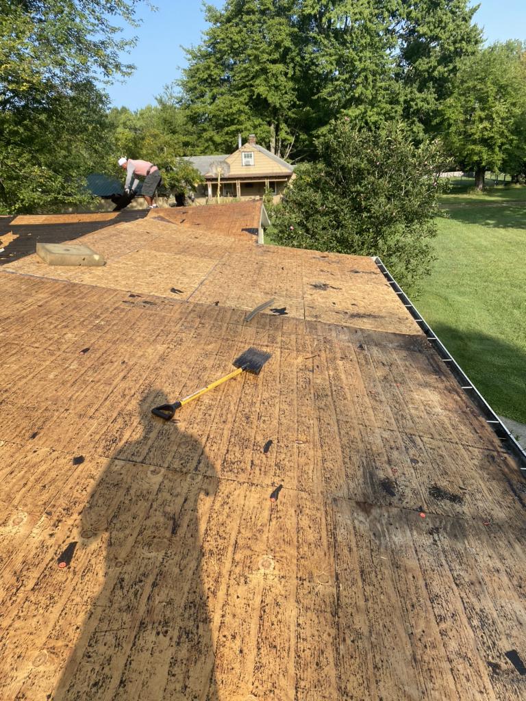 Loveland Garage and Home Receive New Roofs Roof Stripped and Ready