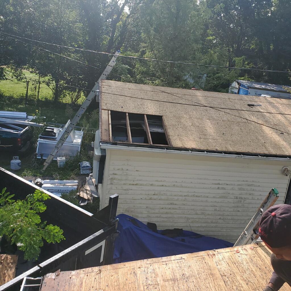 Loveland Garage and Home Receive New Roofs Rotten Wood Removed from