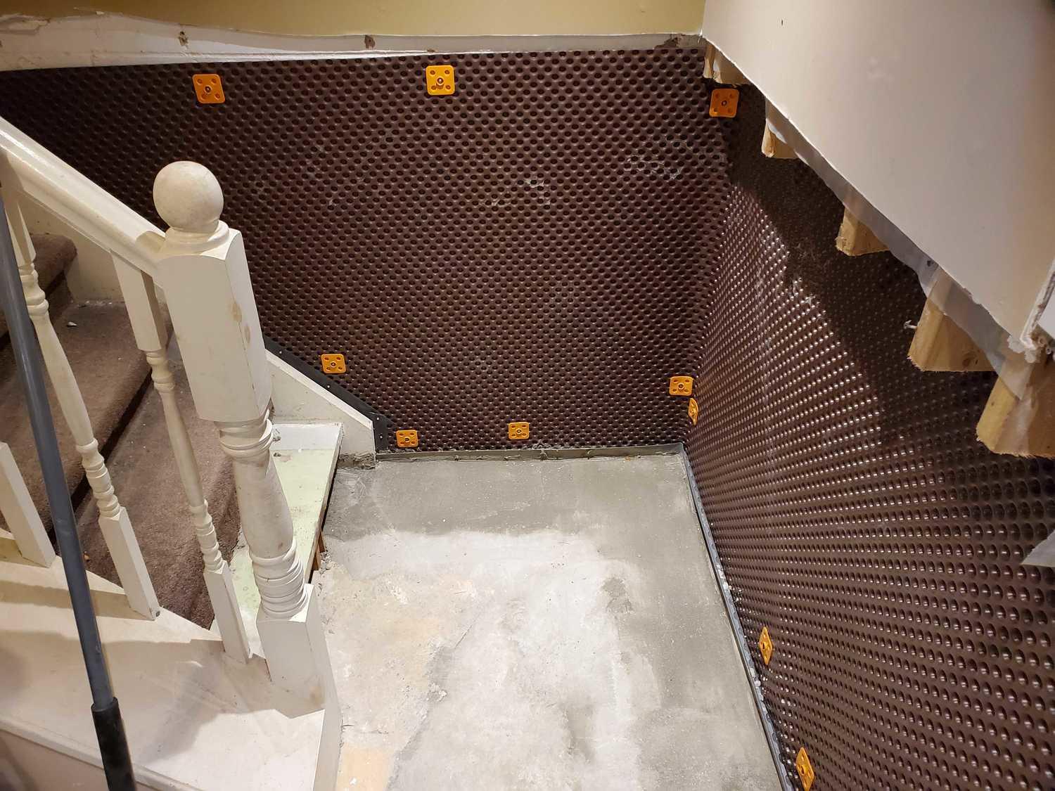 Basement Waterproofing Full perimeter waterproofing in Hamilton, ON behind stairs