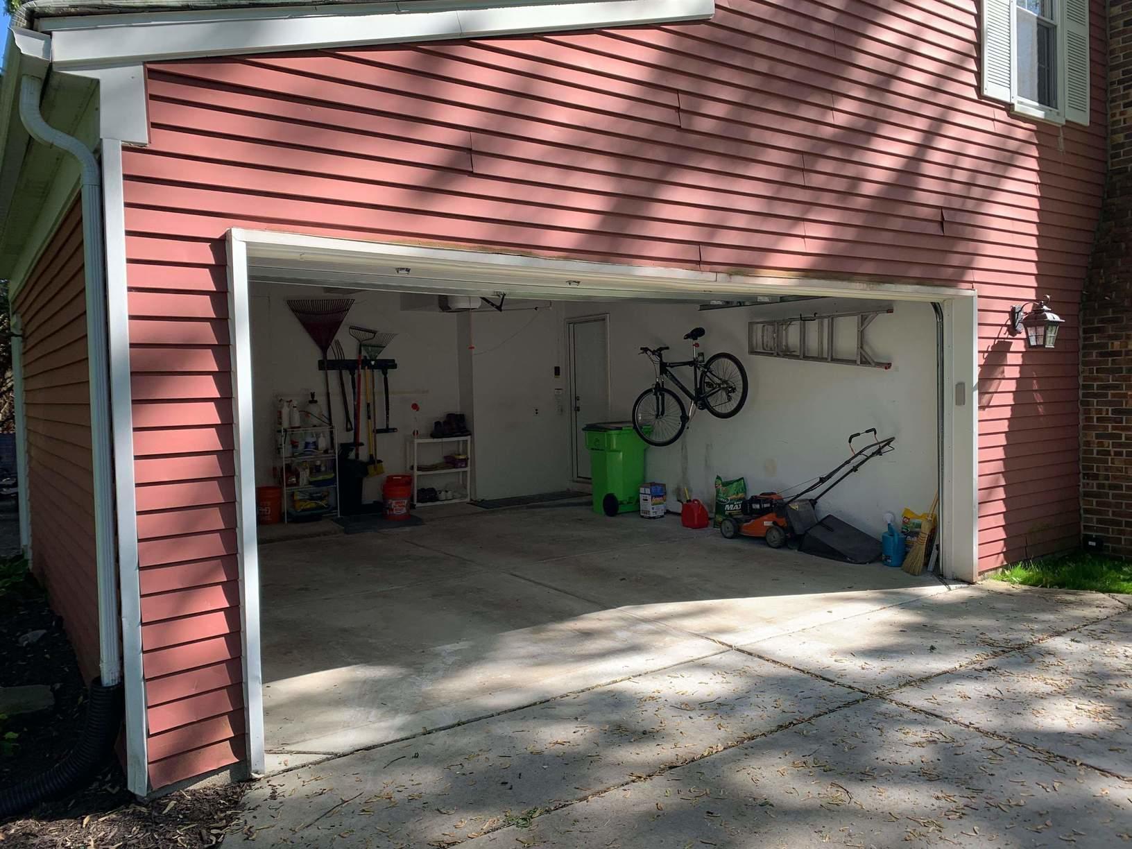 Aluminum Siding and Trim Applied with Rhino Shield Garage Before