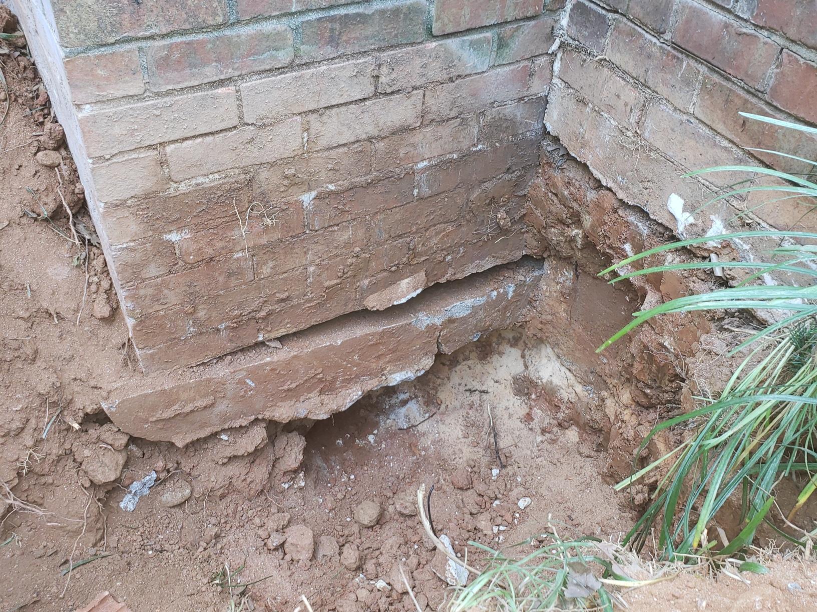 Helical Piers to Stabilize a Porch in Alpharetta, GA Void Under Front