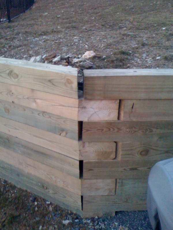 Foundation Repair Wall Anchors Installed to Fix Retaining Wall in